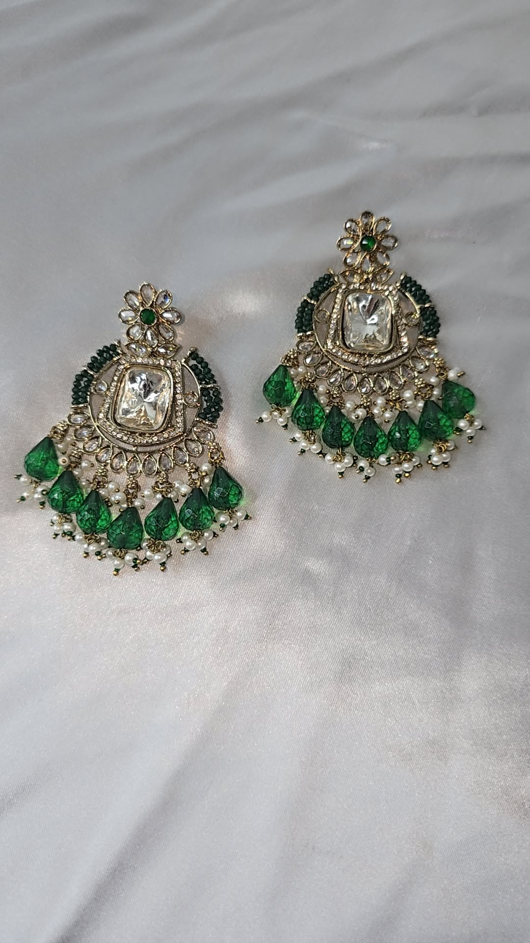 Earrings Mehndi Gold with a combination of reverse AD & front facing AD. Kundan jewellery.