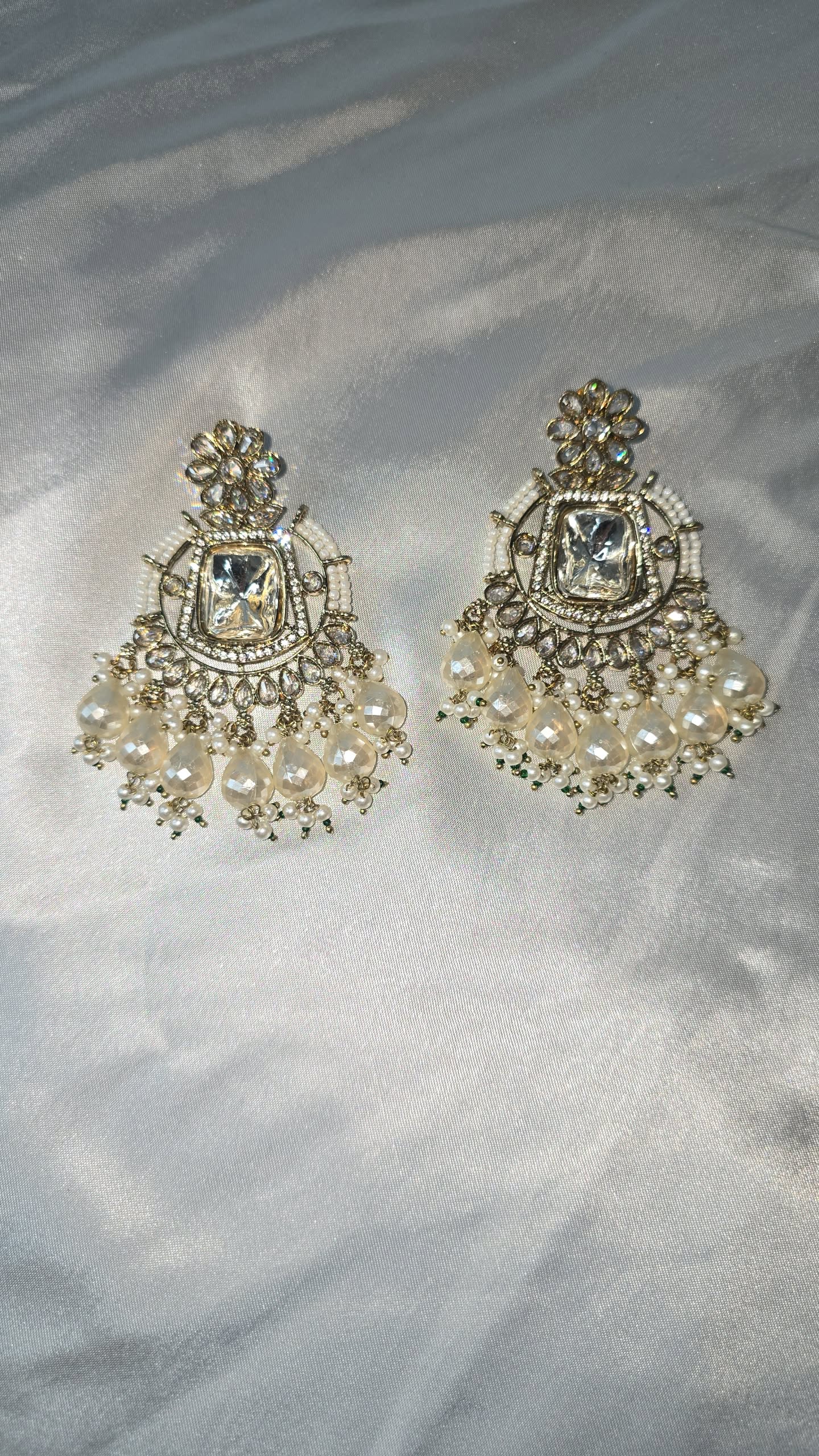 Earrings Mehndi Gold with a combination of reverse AD & front facing AD. Kundan jewellery.