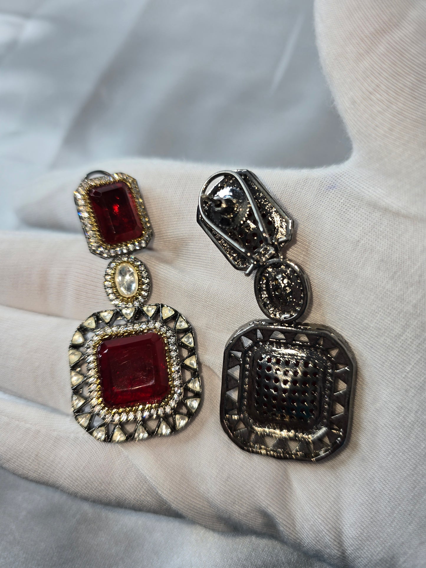 Moissanite Red & Clear Moissanite on Pure brass with a Black Rhodium victorian finish long Mala & Earing set. Hand made only two ever made, collectors piece. Premium kundan jewellery