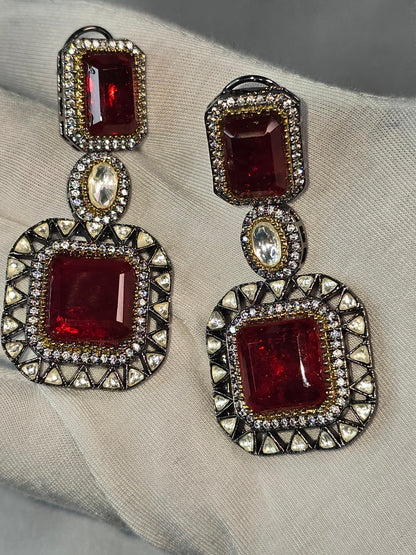 Moissanite Red & Clear Moissanite on Pure brass with a Black Rhodium victorian finish long Mala & Earing set. Hand made only two ever made, collectors piece. Premium kundan jewellery